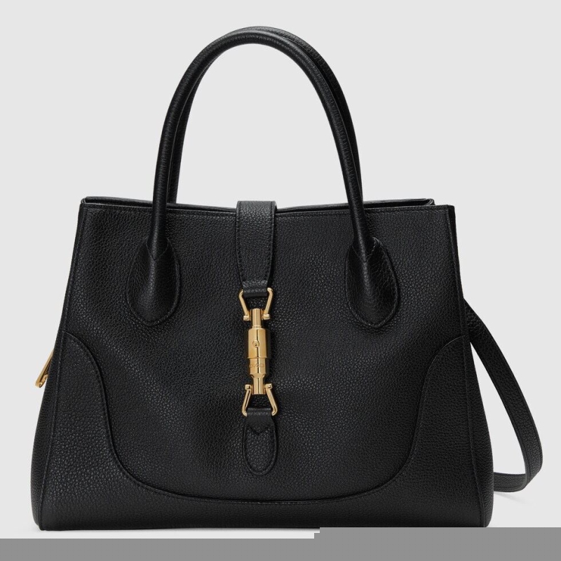 G*u*i shopping bags